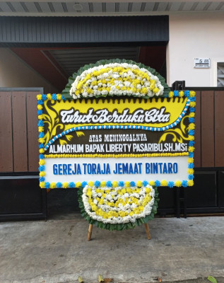 Papan Bunga Duka di Bolo